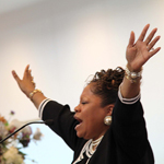 Woman Leading a Prayer